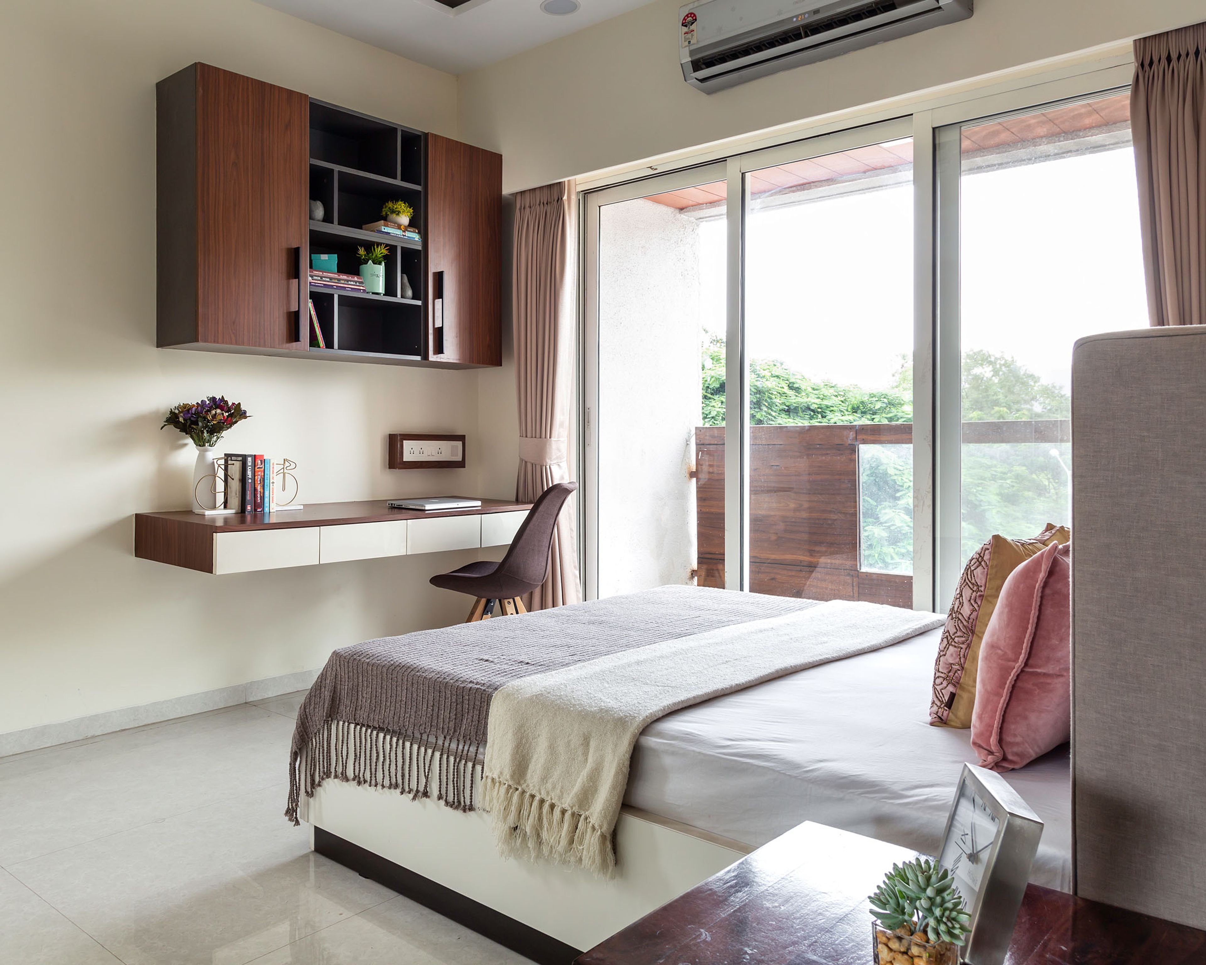 Working space with wall-mounted table and open storage shelves - Livspace