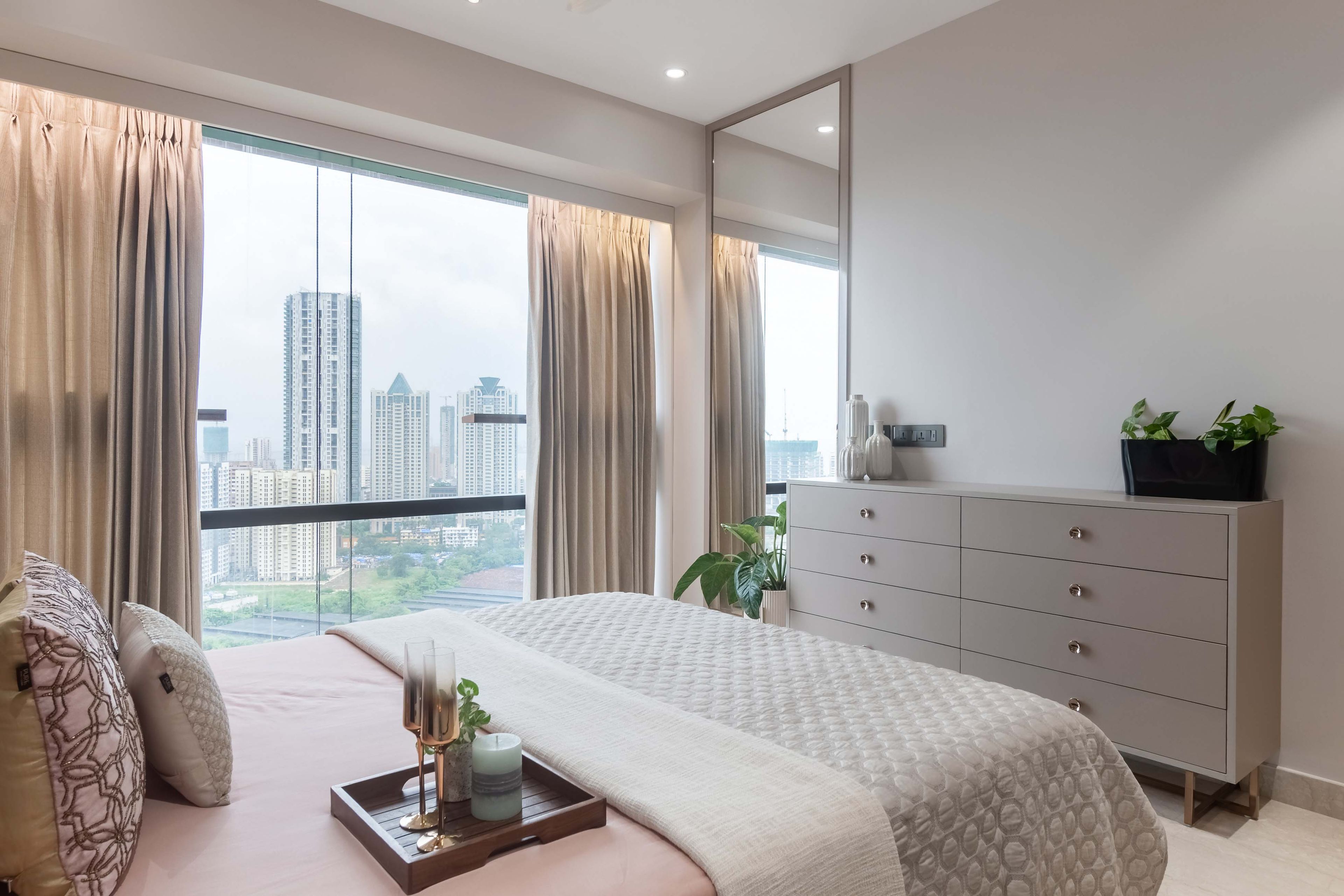 8-drawer beige storage unit with mirror - Livspace