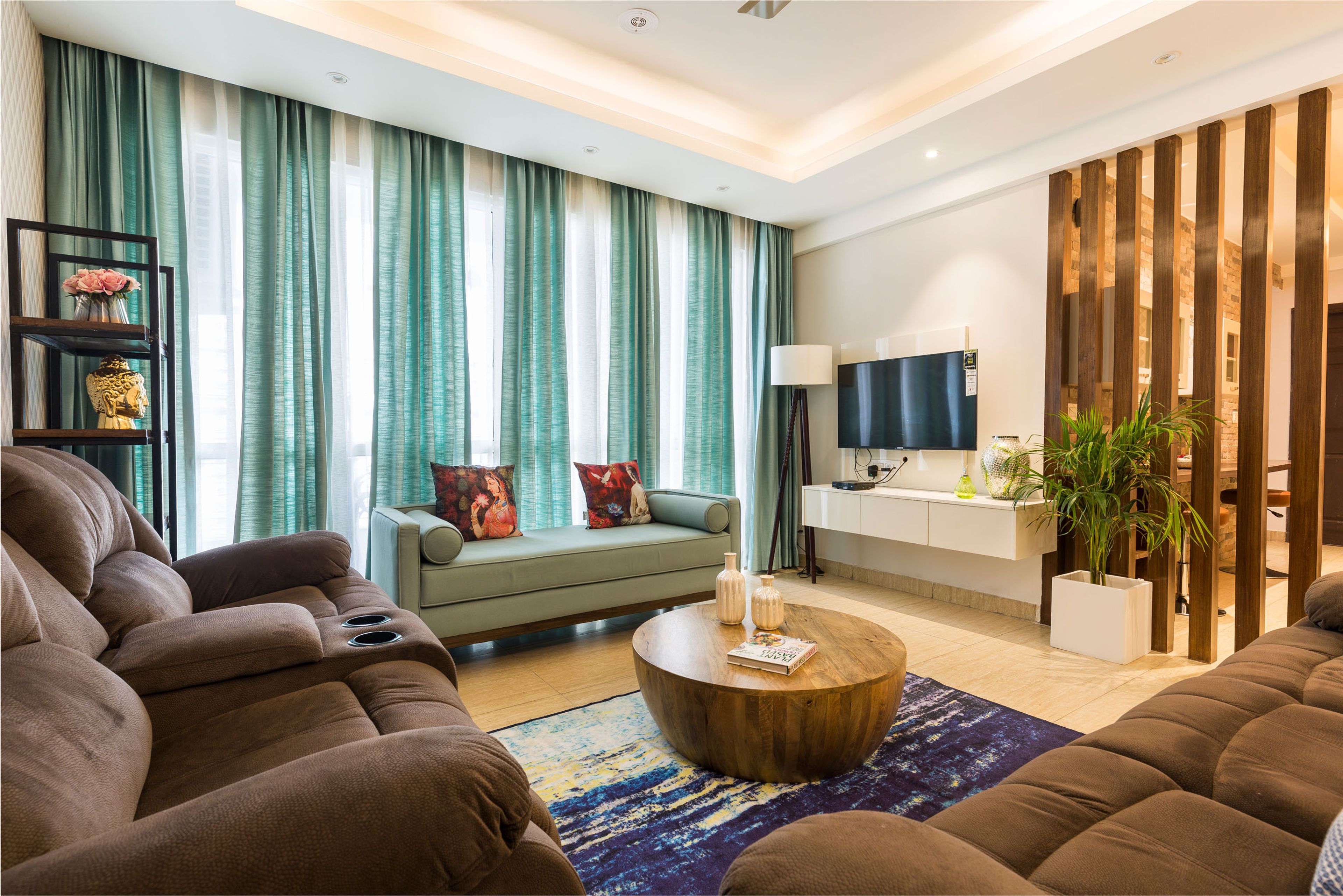 Contemporary 3-BHK Flat In Noida With U-Shaped Living Room Design