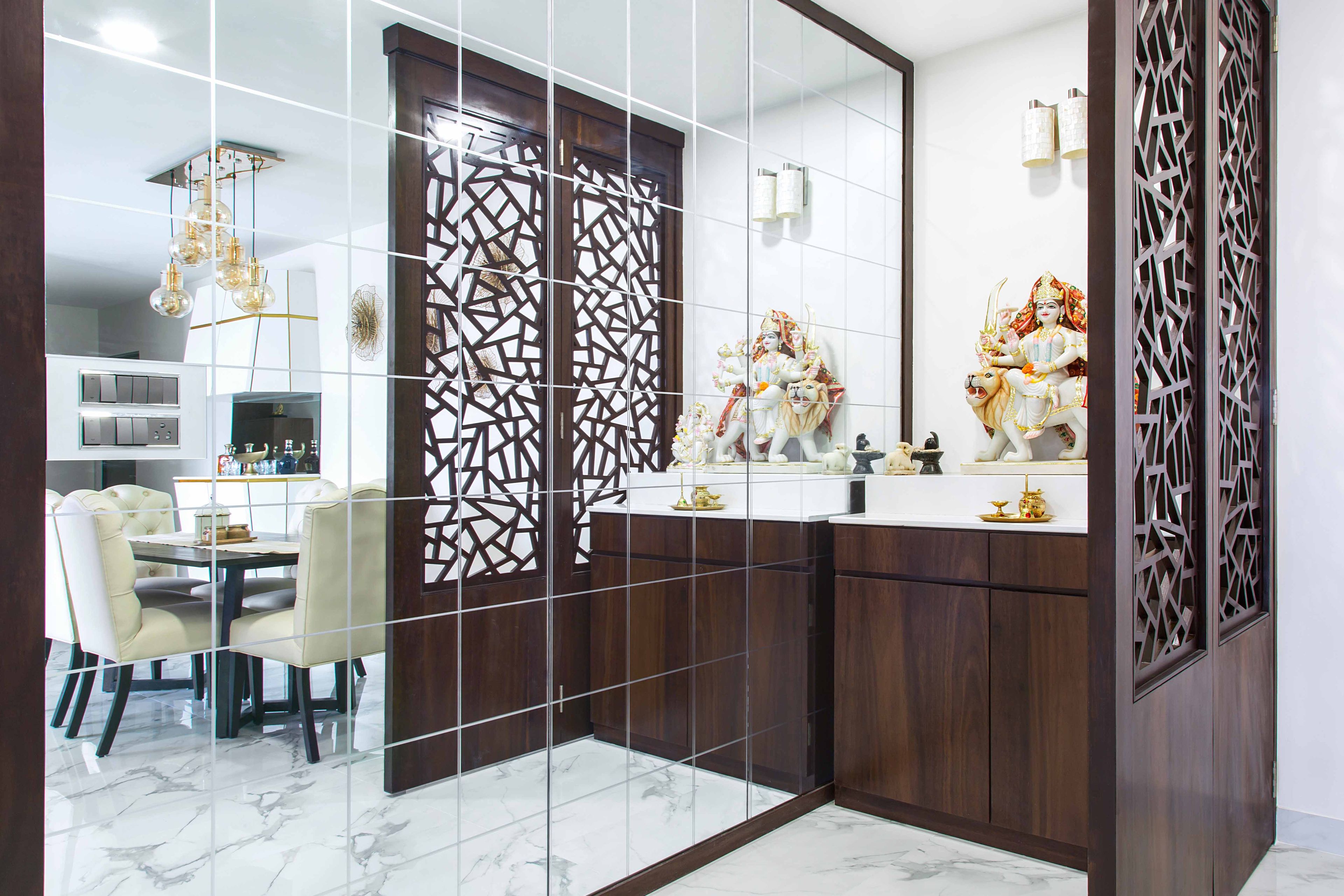 Minimal pooja unit with mirror wall and wooden jali - Livspace