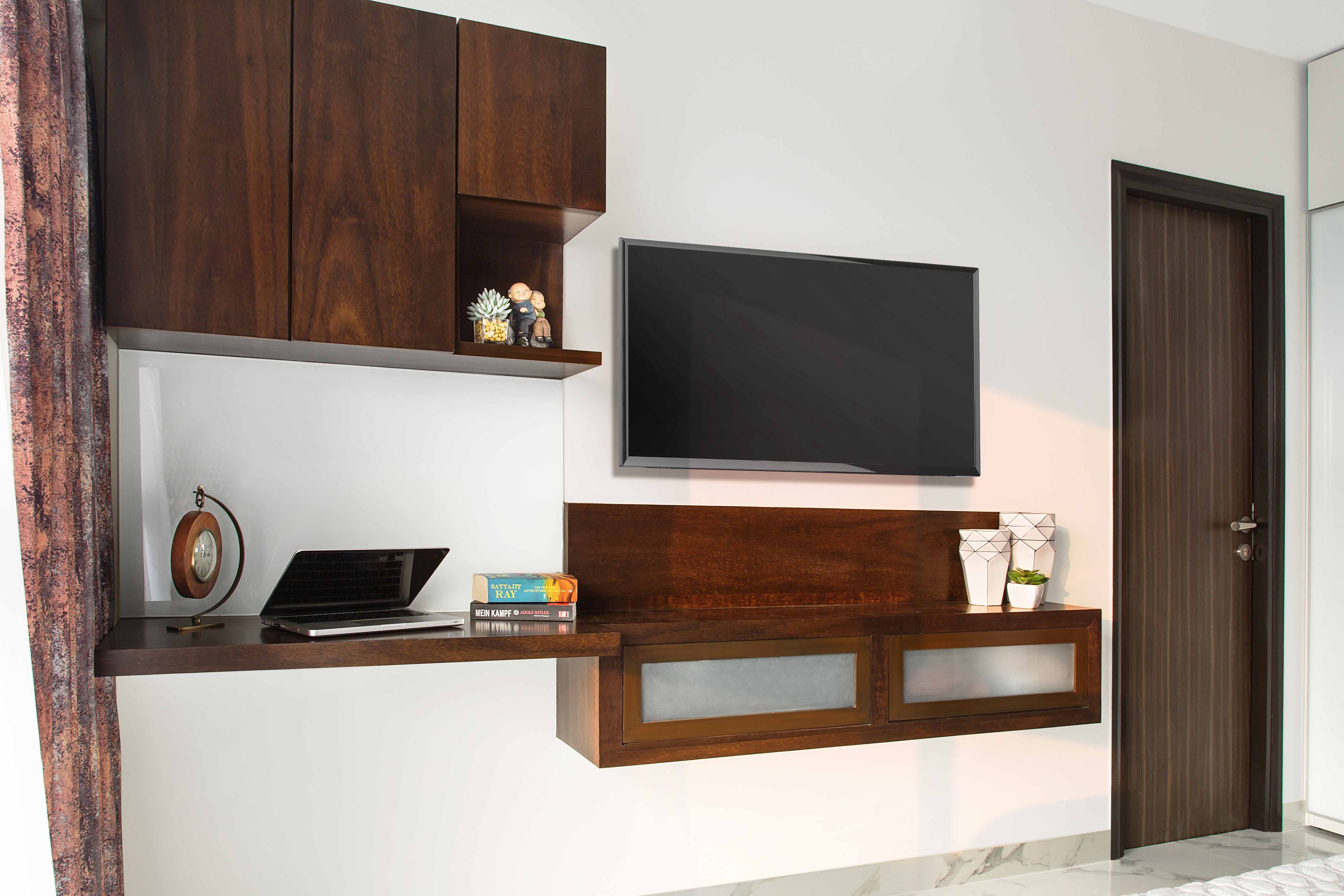 TV unit with wall mounted desk and open storage - Livspace