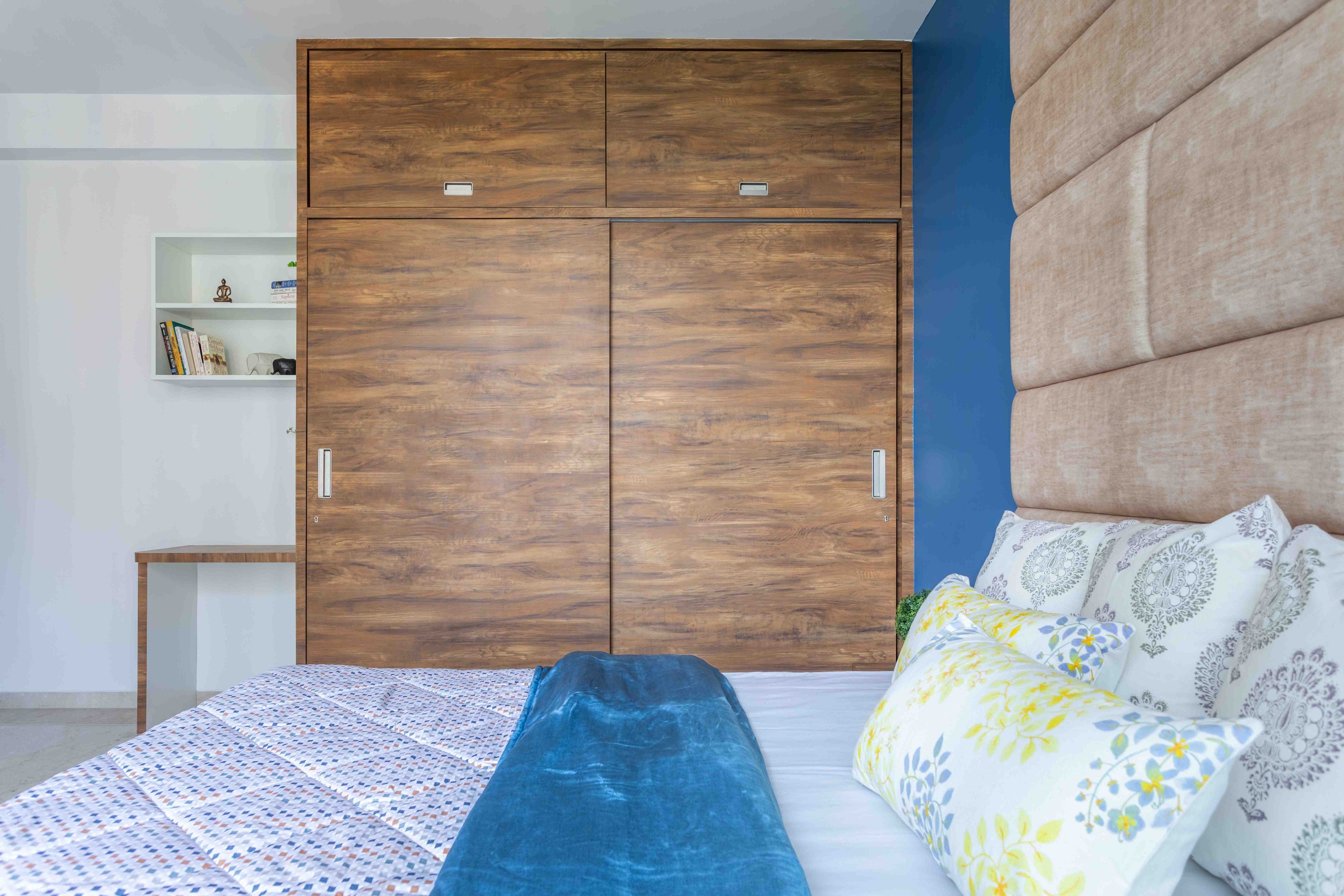 2-door sliding wardrobe with loft with wooden finish - Livspace