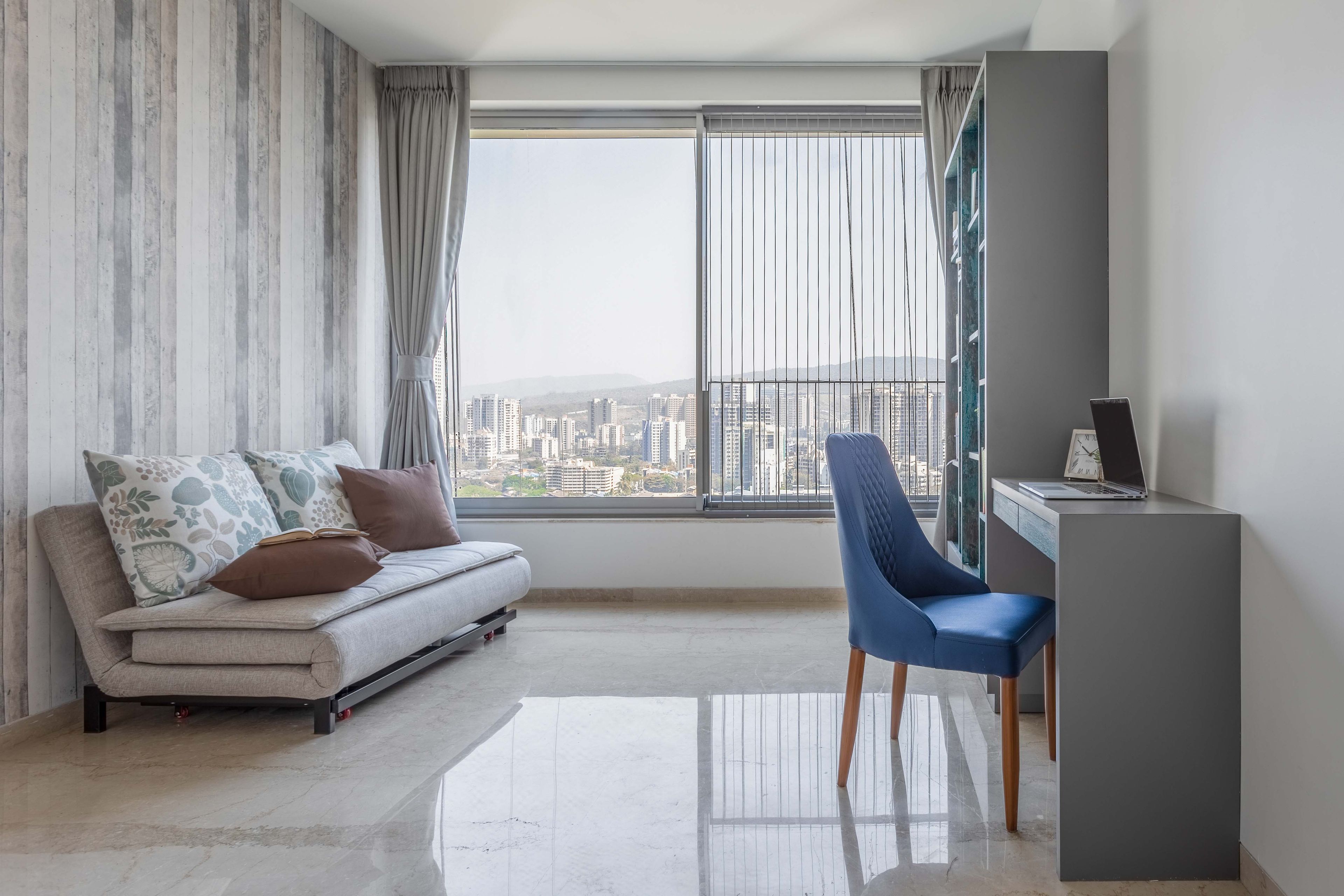 Grey wallpaper with sofa and working table - Livspace