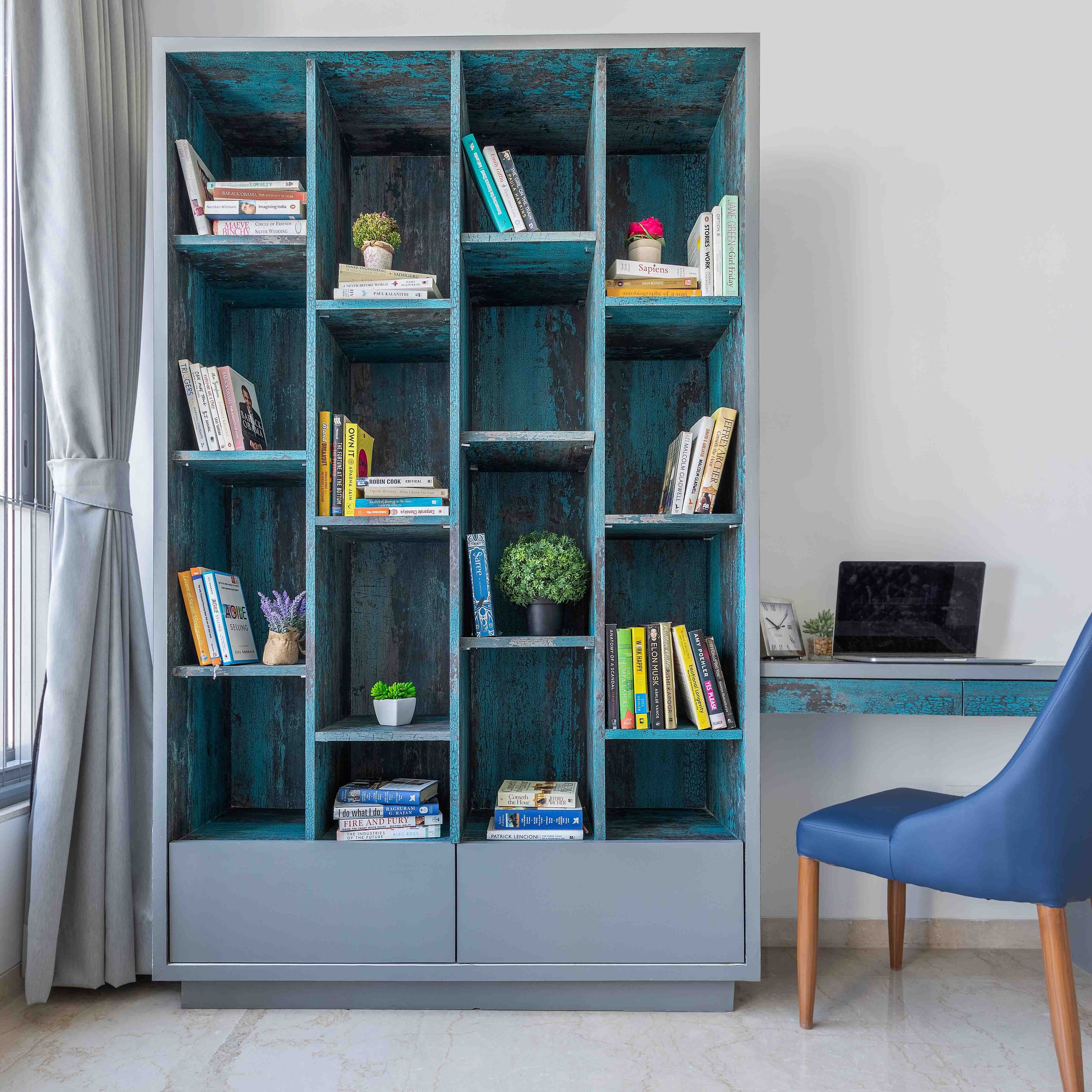 Blue and grey bookshelf - Livspace