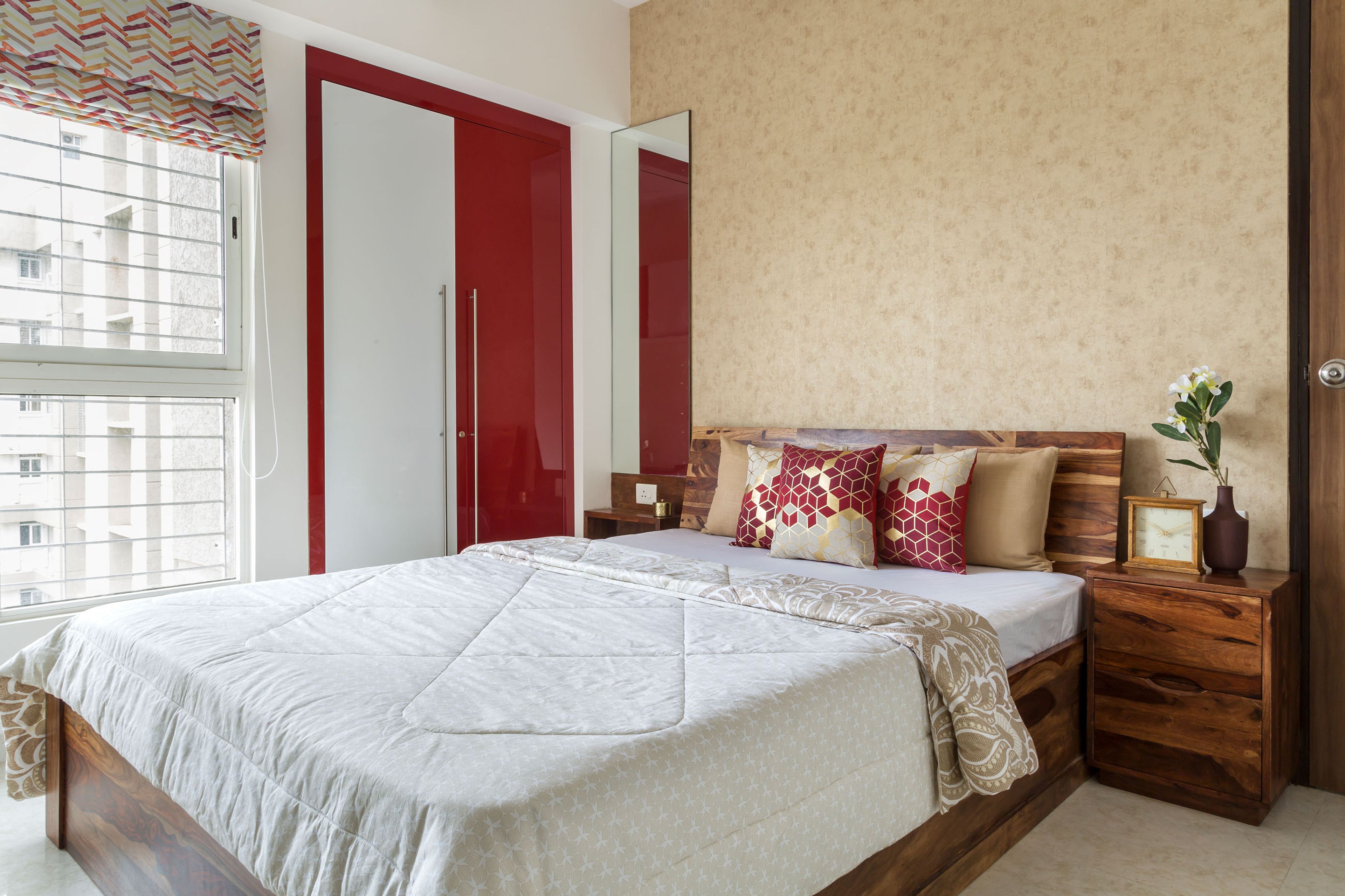 Modern 2-BHK Flat In Mumbai With Brown and Gold Leafy TV Panel Wallpaper