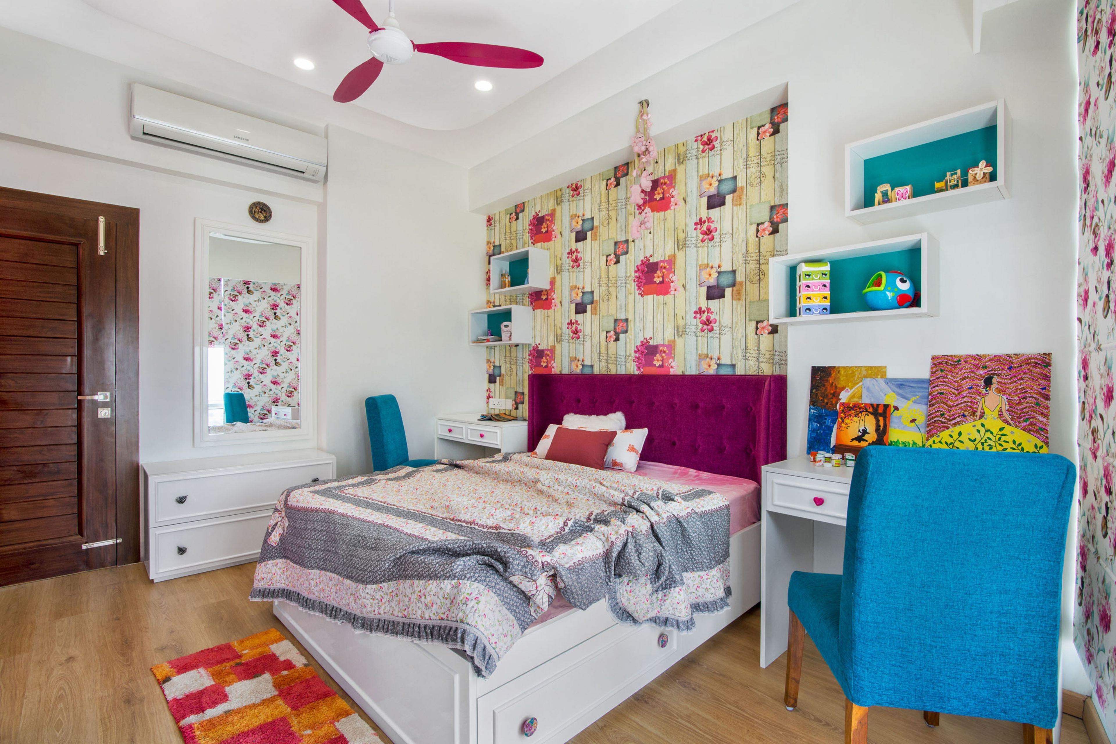 Multicoloured kids room design with magenta headboard - Livspace