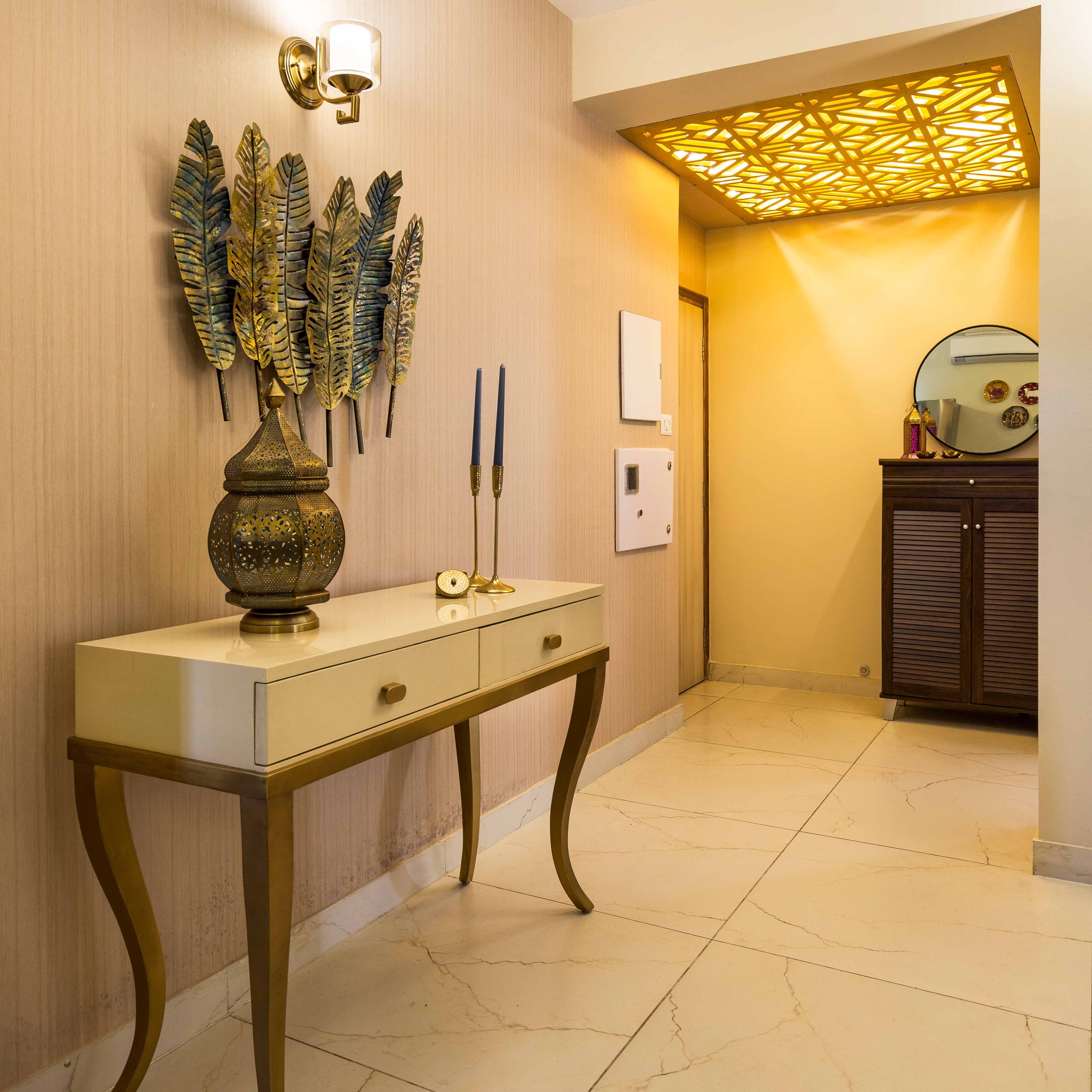 Beige foyer design with console table - Livspace