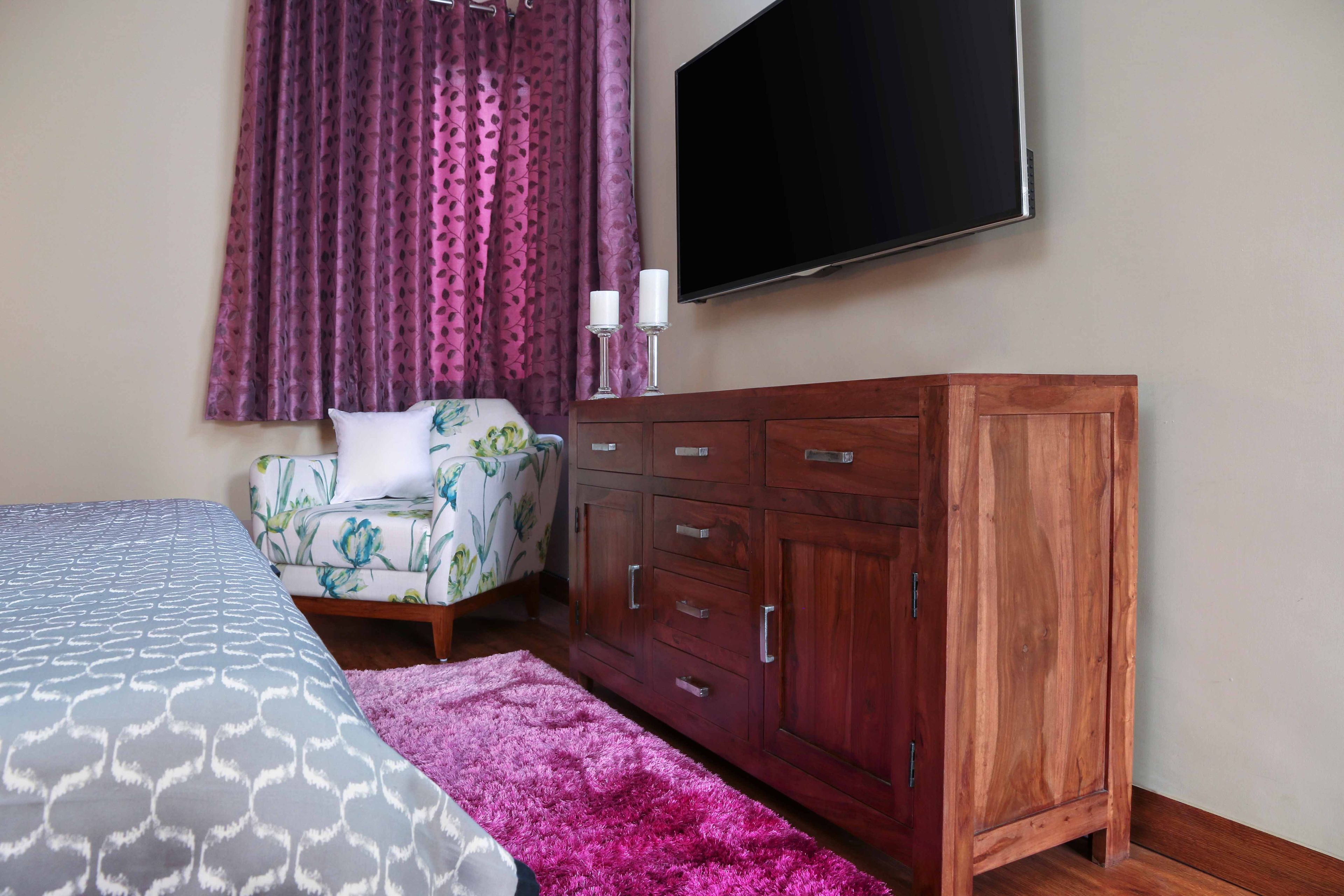 TV cabinet with wooden console for the bedroom - Livspace