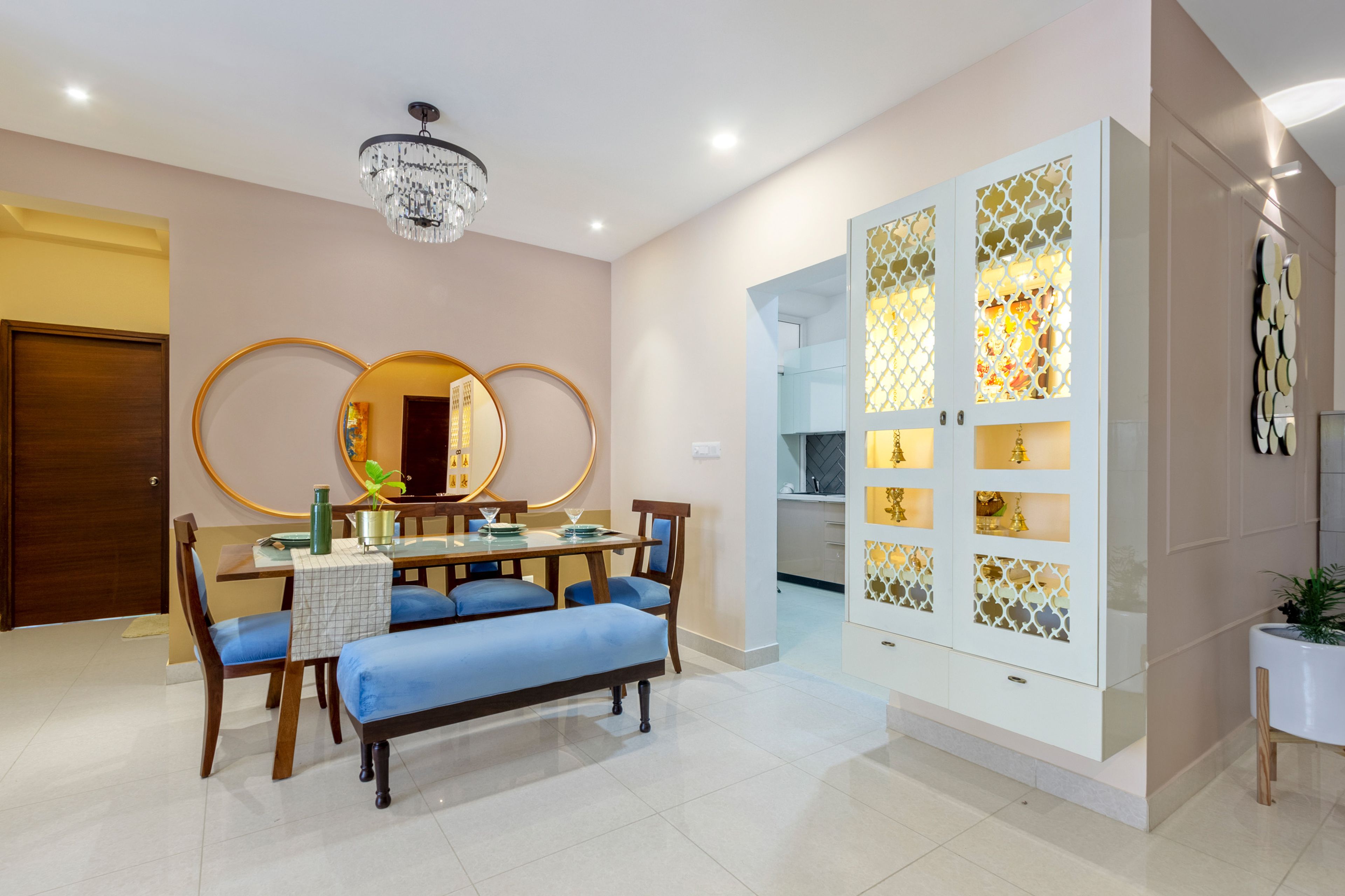 Modern 2-BHK Flat Design In Bangalore With Spacious Teal Blue And White Master Bedroom