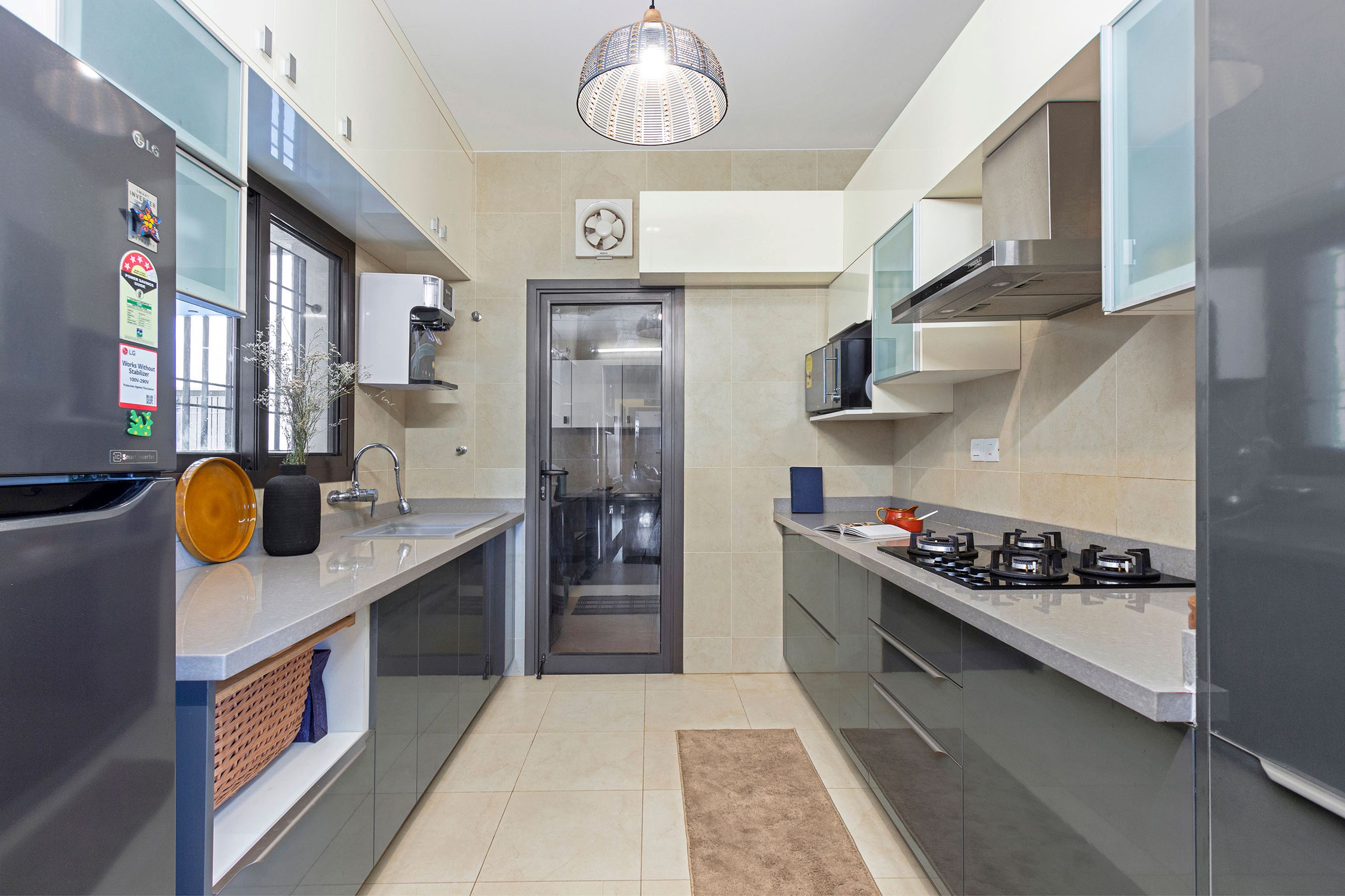 Modern Parallel Modular Kitchen Design In River Stone And Champagne-Tones