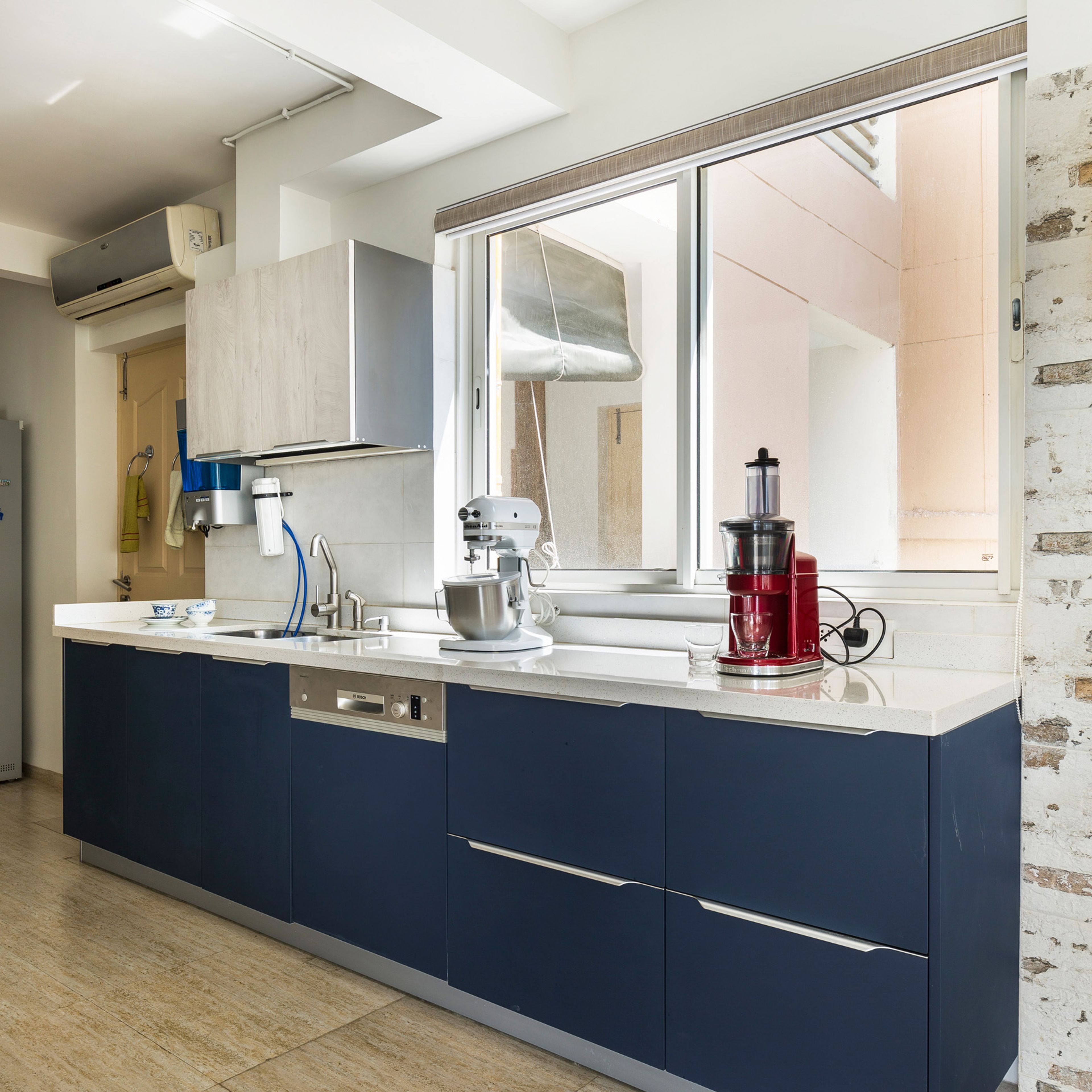 Modular Parallel Kitchen Design With Oak And Blue Cabinets - Livspace