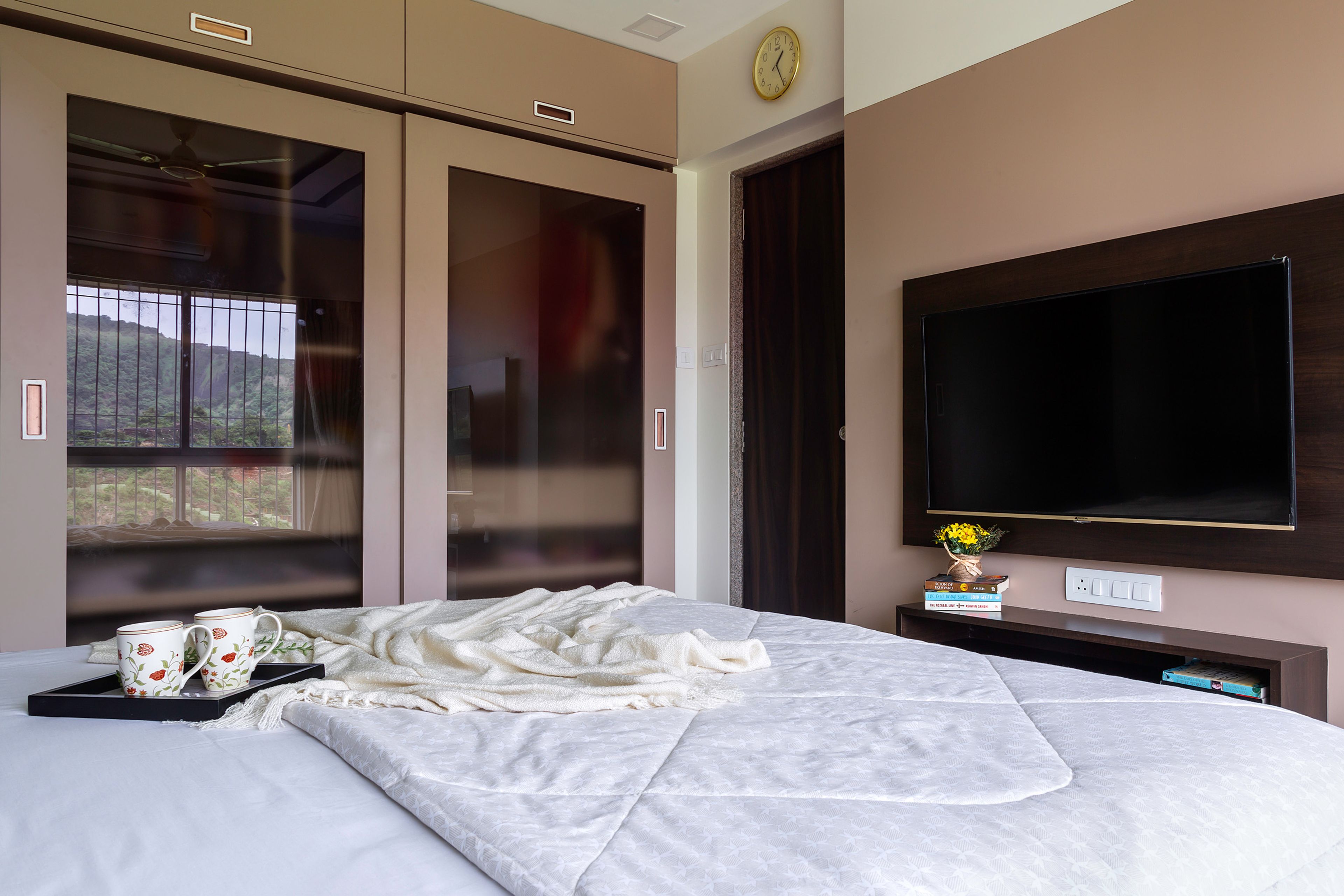 Master Bedroom Design With Brown Chequered Headboard - Livspace