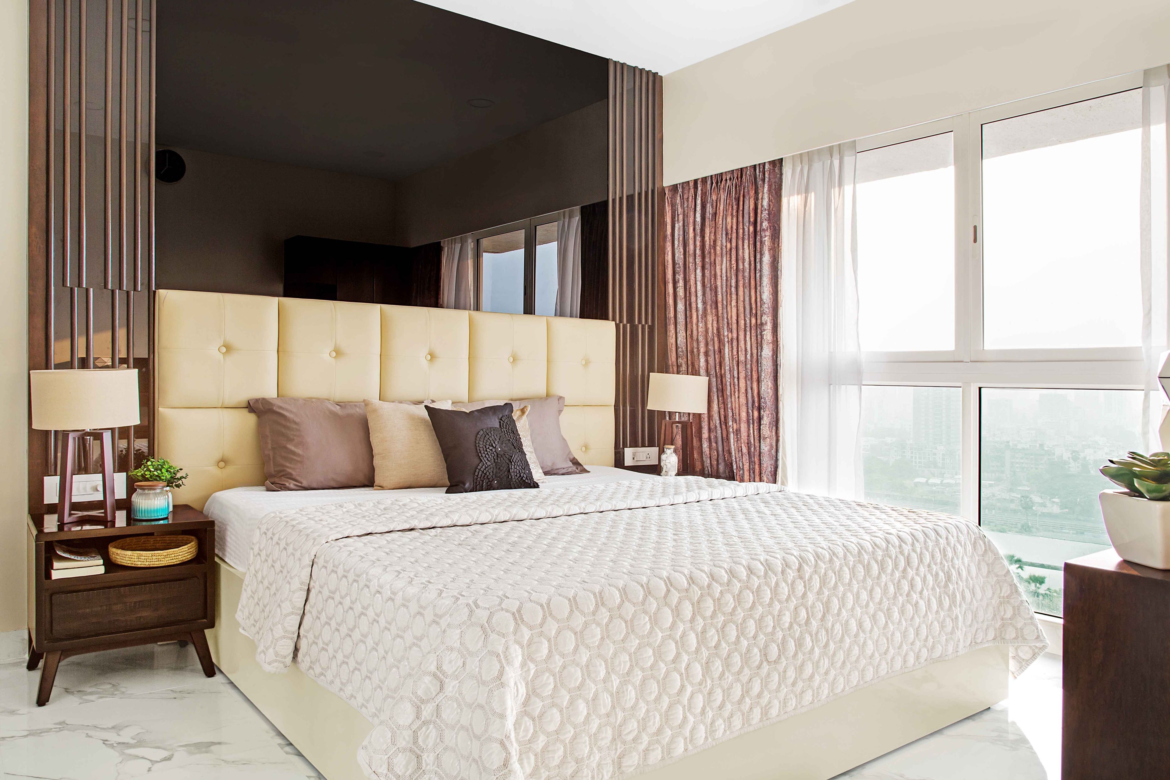 Modern Master Bedroom Design With Dark Glossy Accent Wall And Copper-Toned Panelling