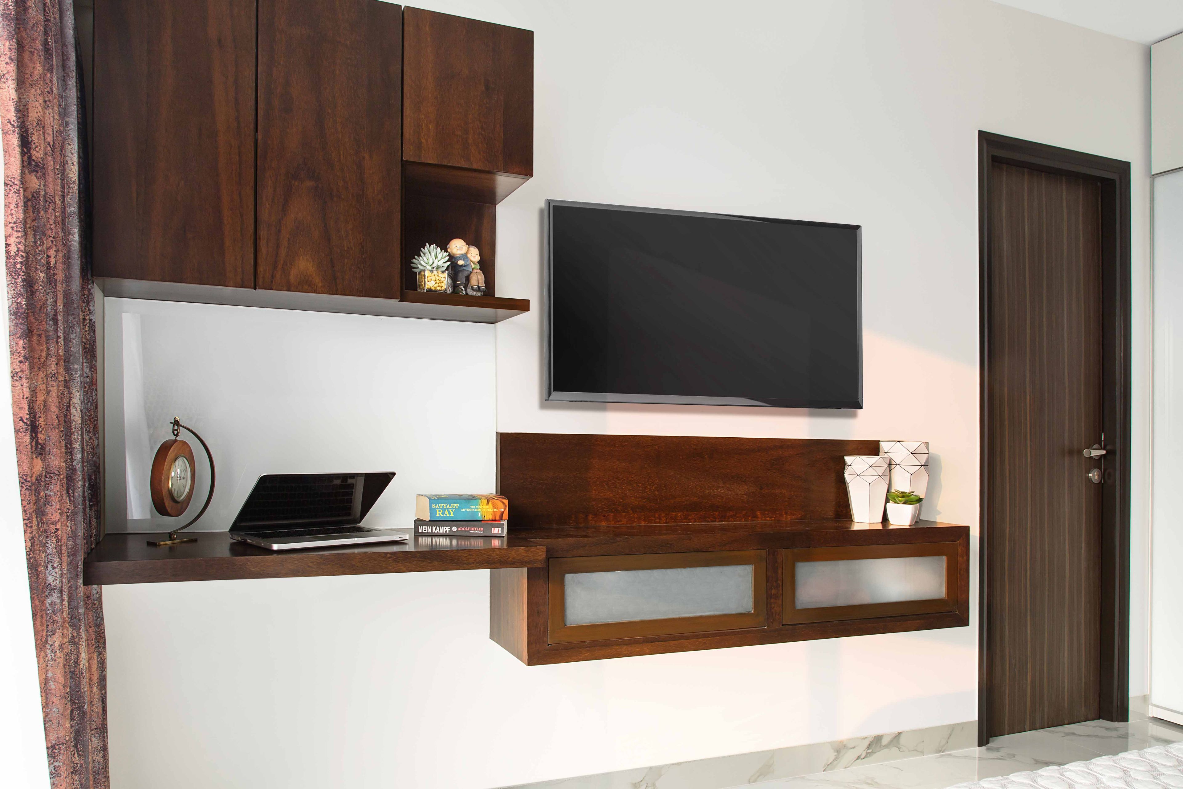 Master Bedroom Design With Dark Glossy Accent Wall And Copper-Toned Panelling - Livspace