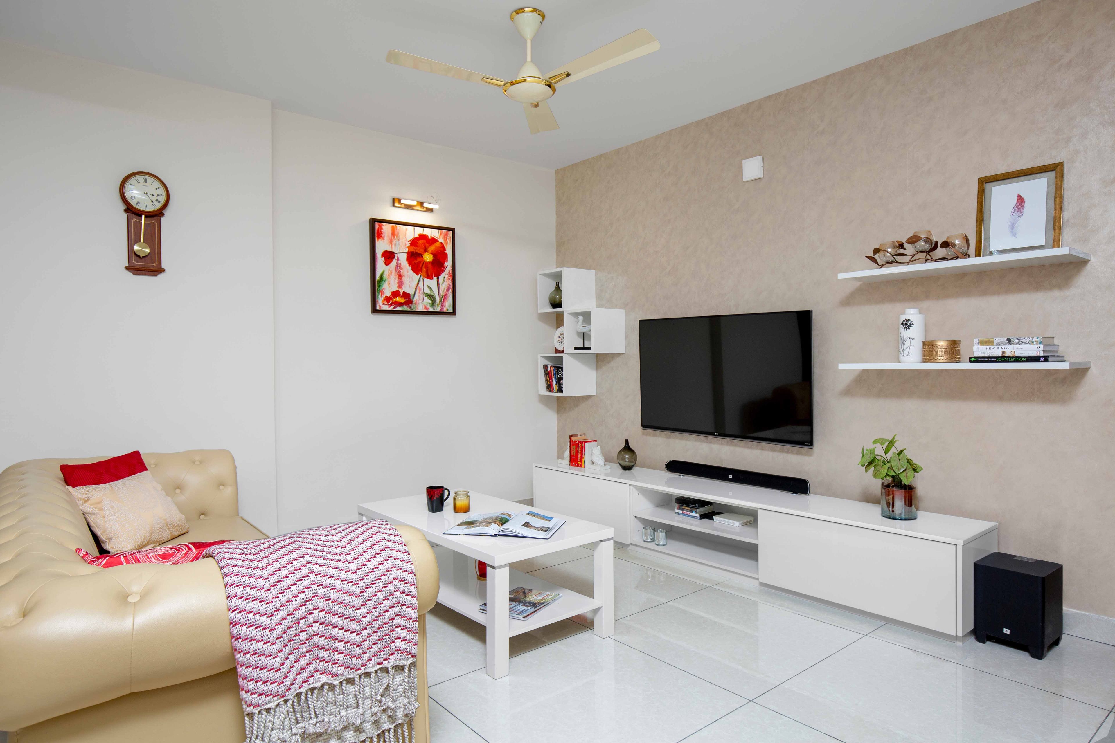 Frosty White TV Unit Design With With Floating Shelves - Livspace