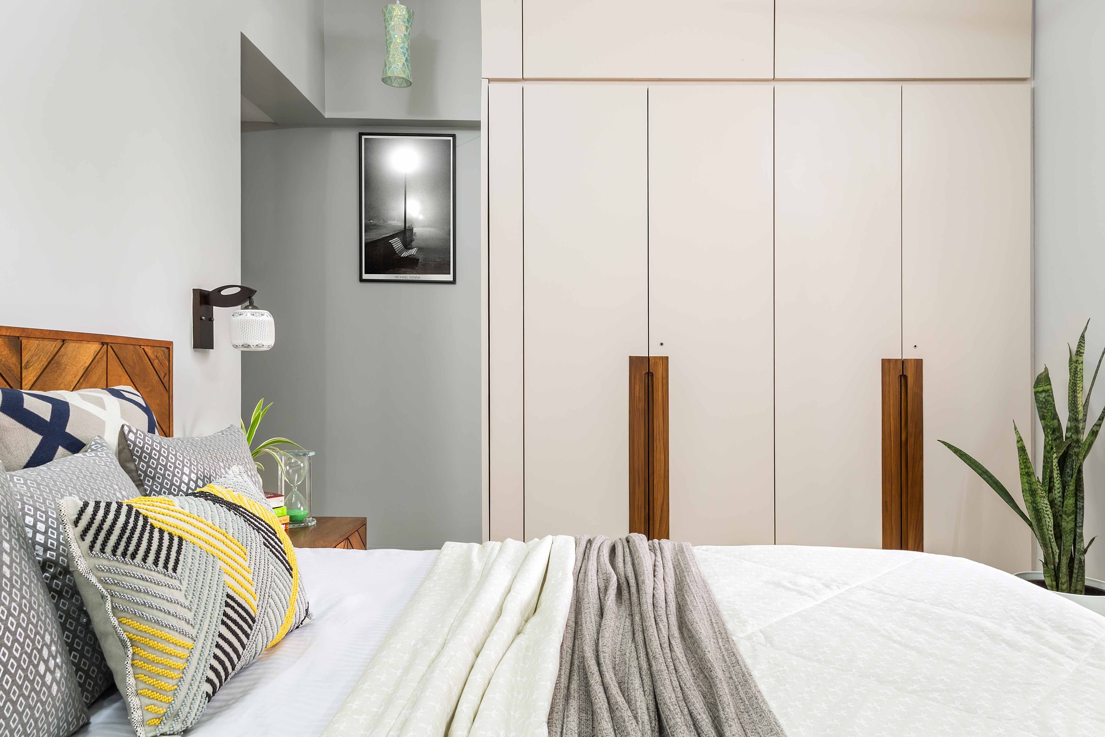 Minimal 4 Door Swing Wardrobe Design With Laminate In Suede Finish