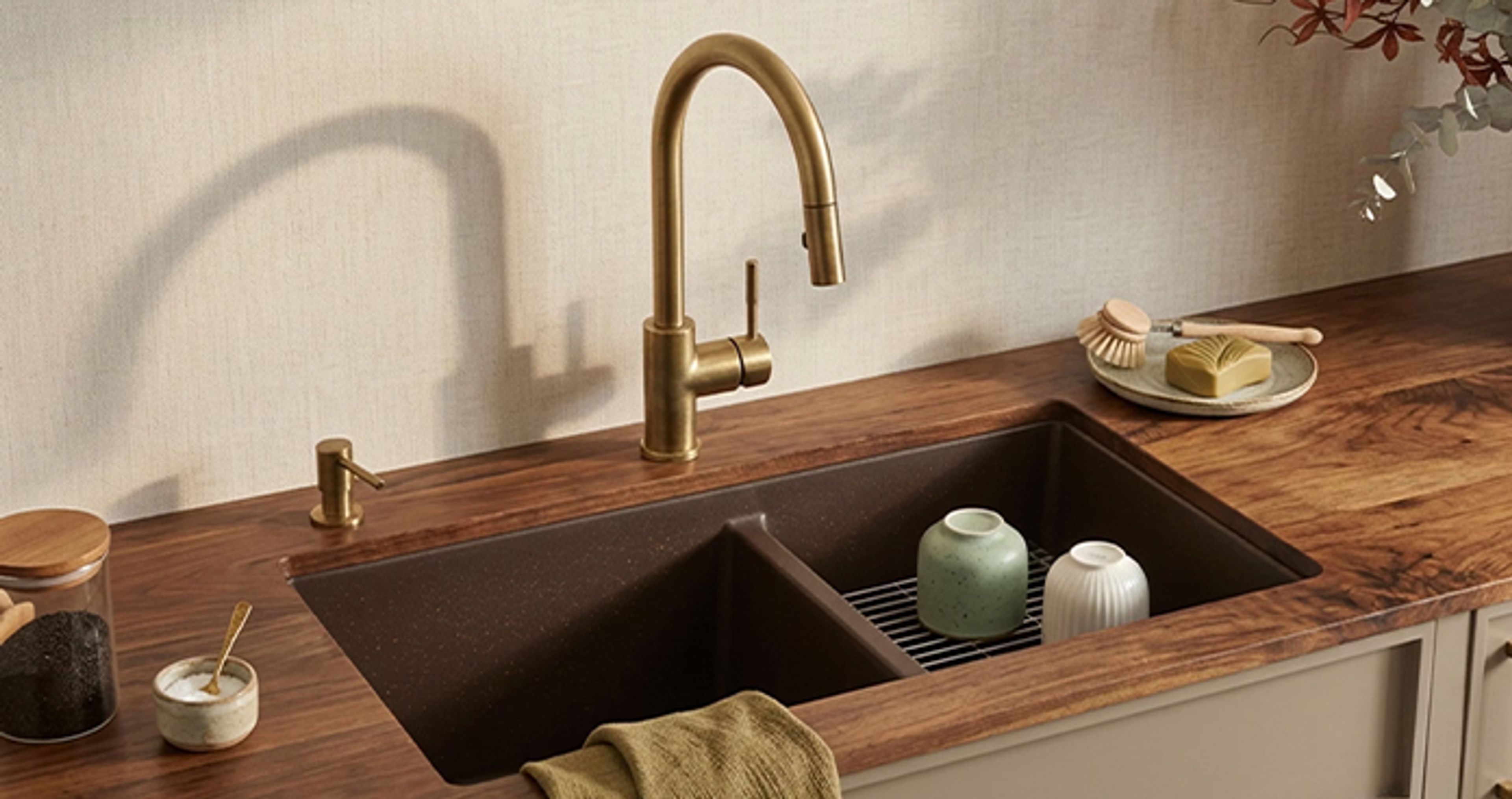 Rectangular undermount quartz basin wash with brass fittings and blue kitchen cabinets - Livspace