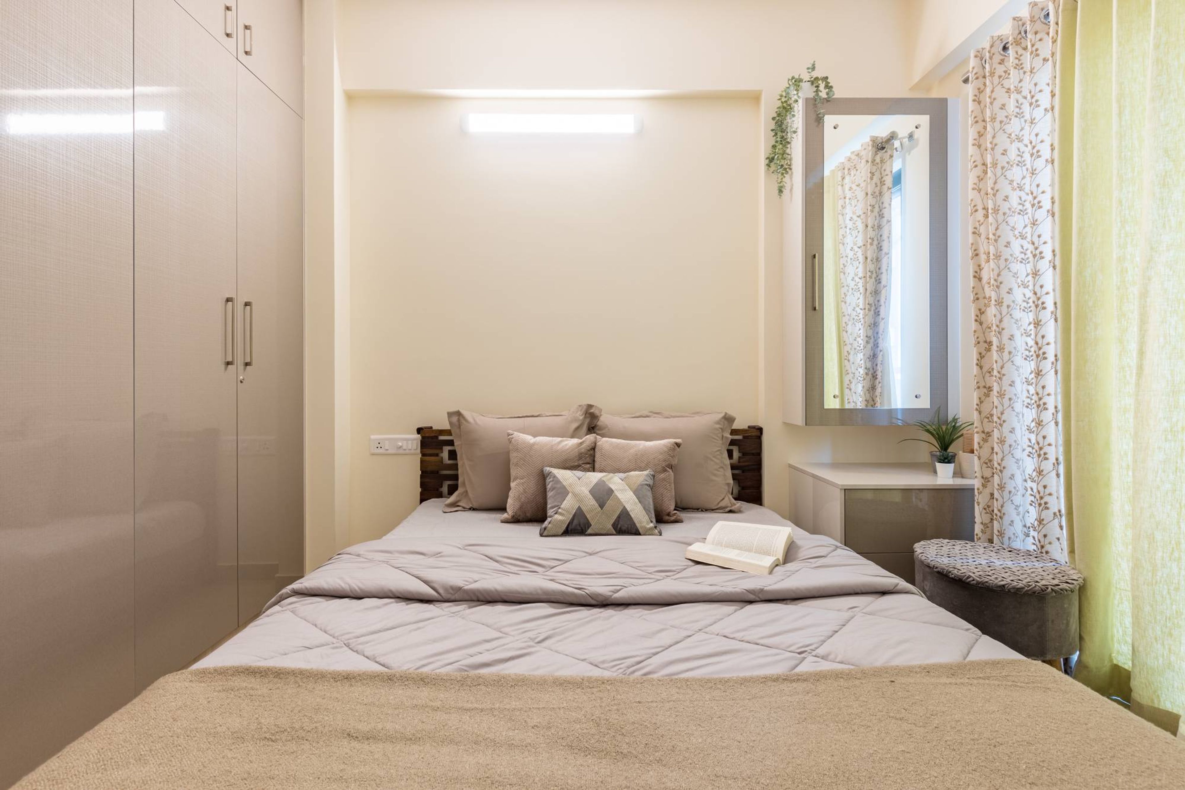 Compact Guest Bedroom Design With Glossy Beige Wardrobe