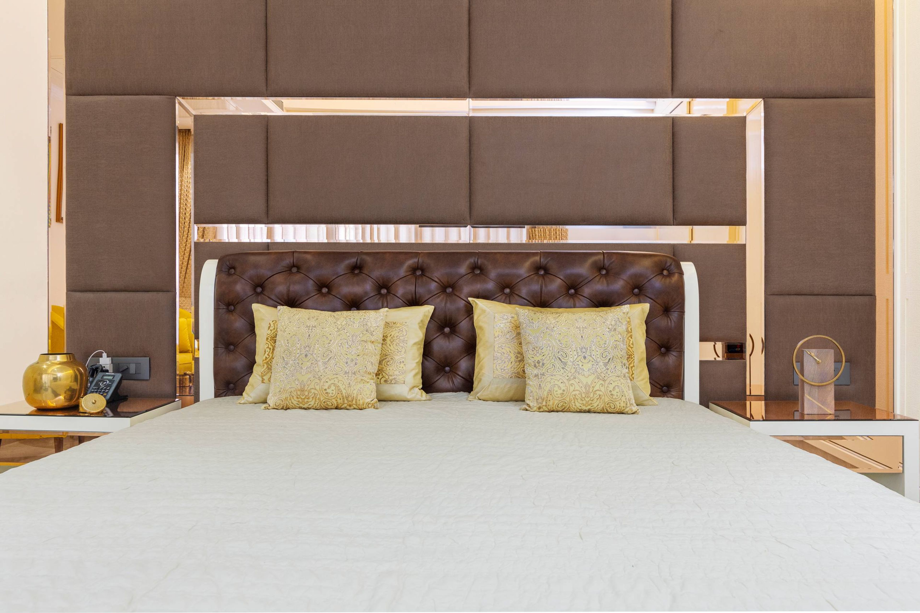 Classic Guest Room Design With Brown Tufted Headboard