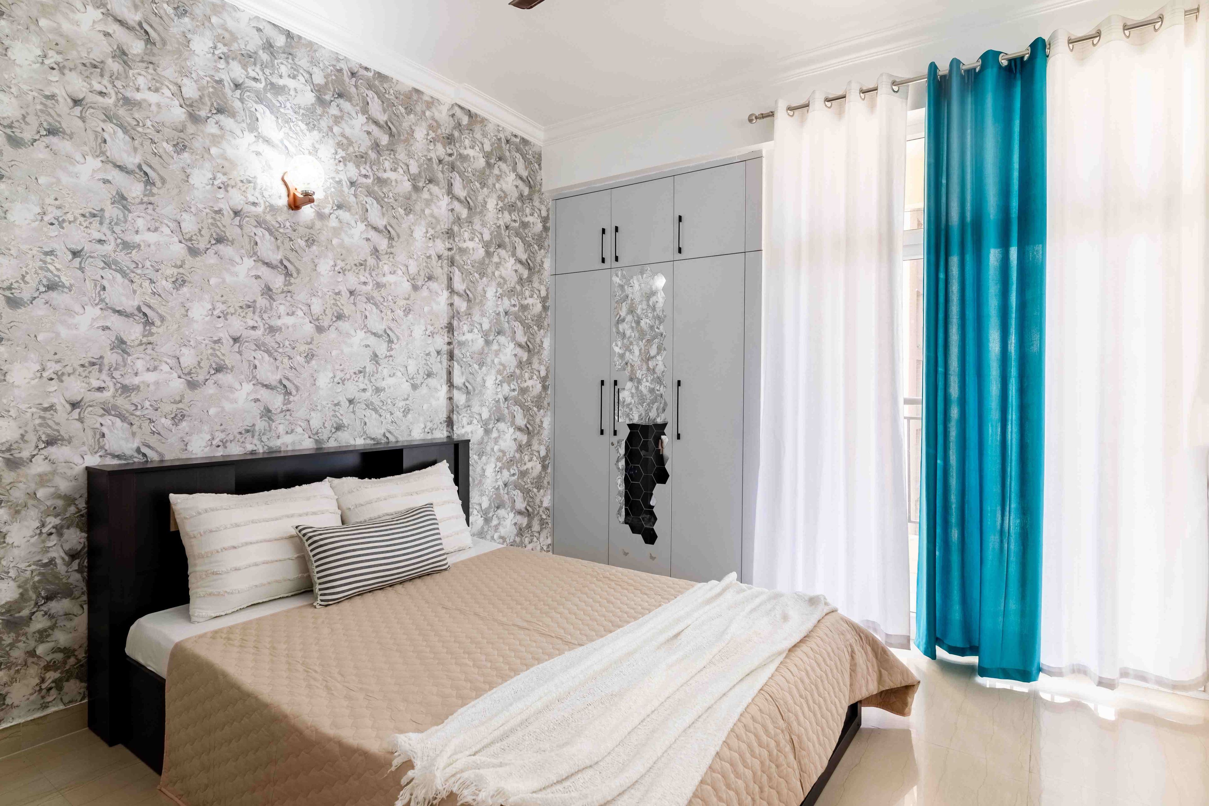 Modern Bedroom Design With A Queen Size Bed And A Swing Wardrobe