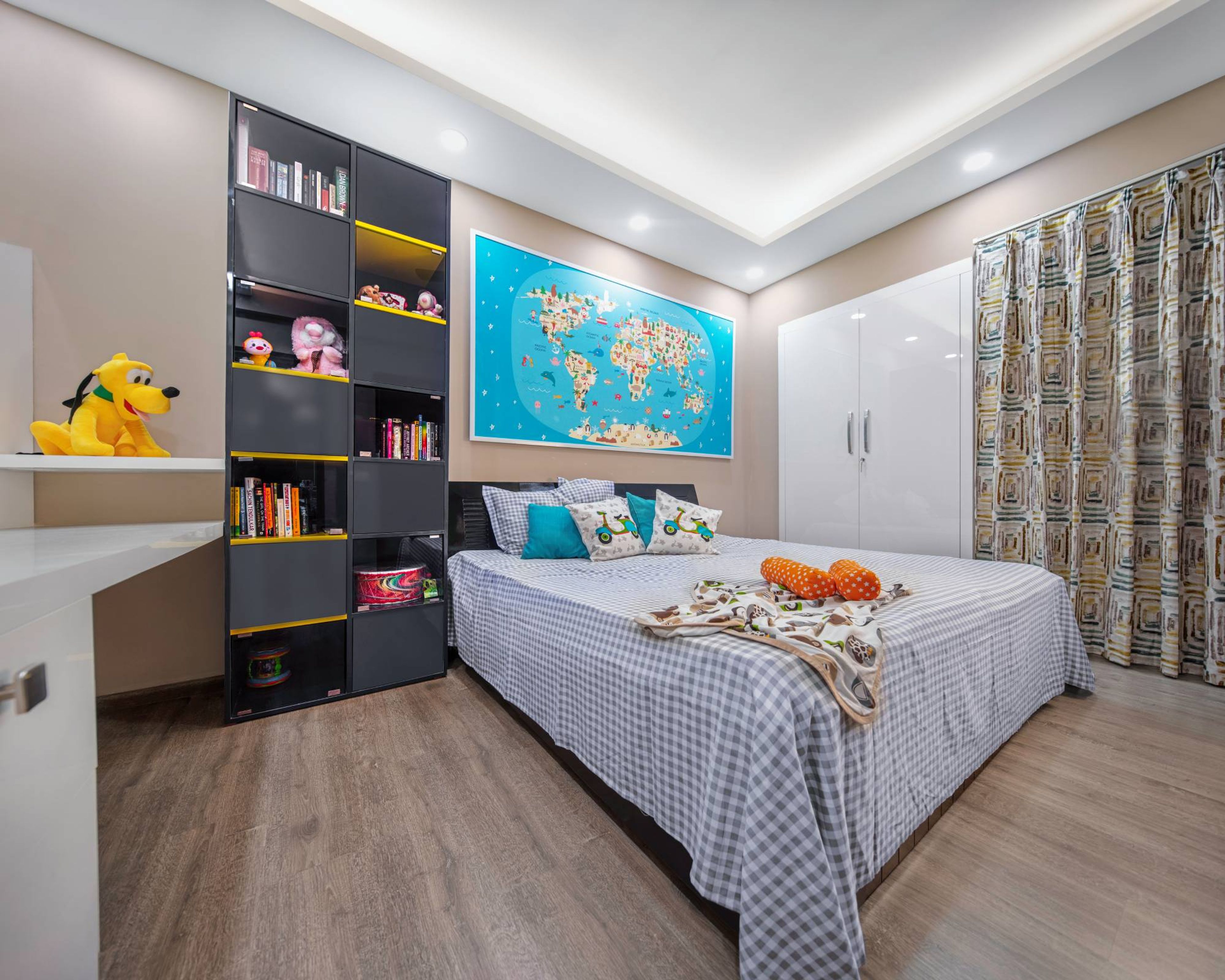 Modern Kids Room Design With A Tall Black Storage Unit