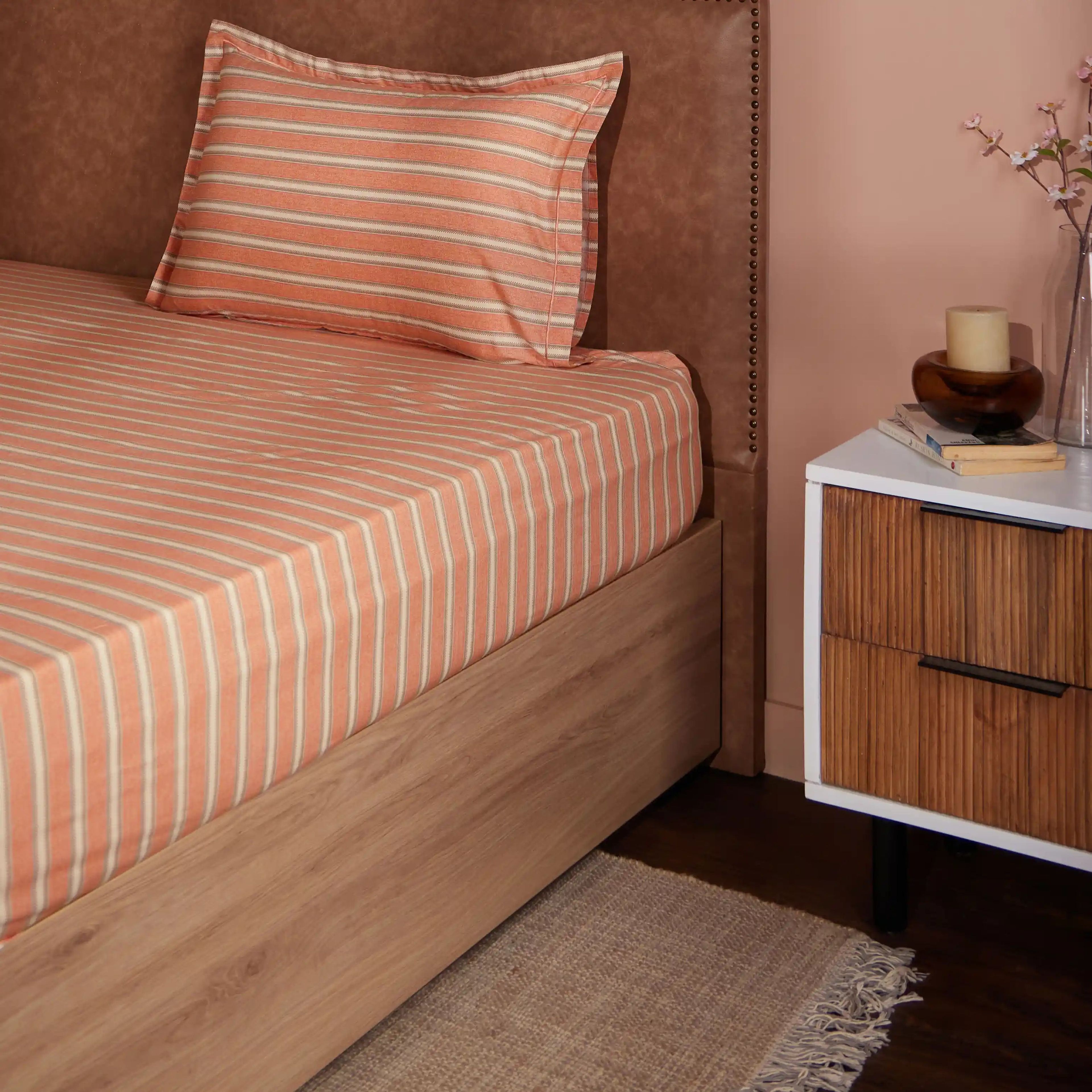 Threadscapes | Woven Textured Printed Cotton Bedsheet Set | Pillow Cover with Merrow Hem Treatment-Peach