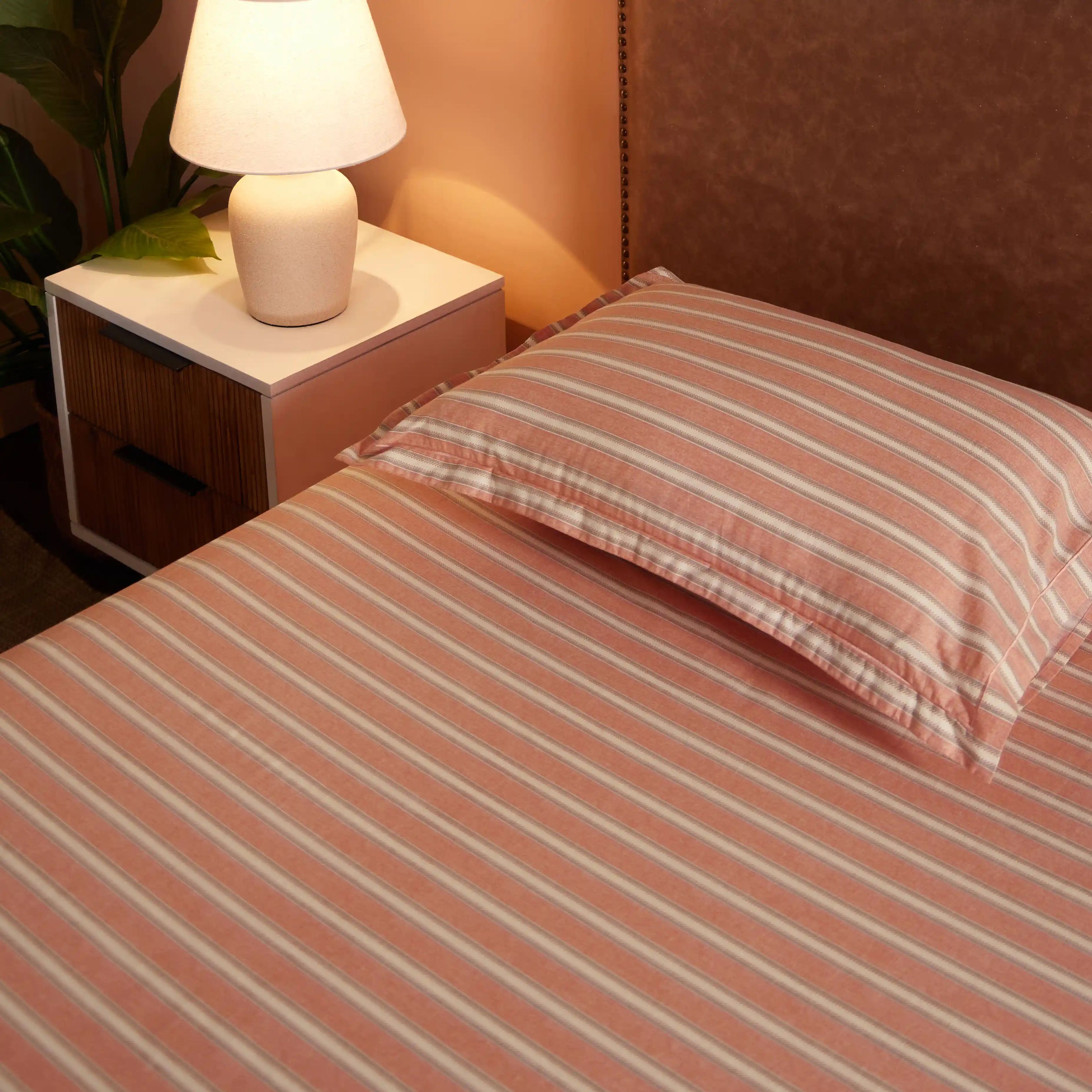 Threadscapes | Woven Textured Printed Cotton Bedsheet Set | Pillow Cover with Merrow Hem Treatment-Peach