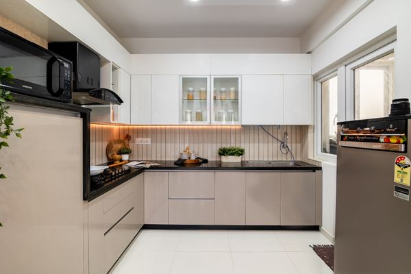 L-Shaped Kitchen Design With Ambient Lighting