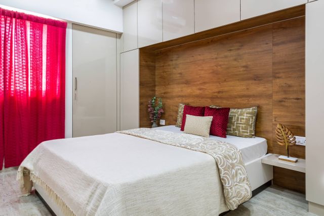 Spacious Guest Bedroom Design With Light Beige Wall | Livspace