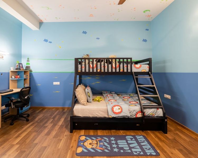 Blue Bedroom Wall Paint With Galaxy-Themed Ceiling Design | Livspace