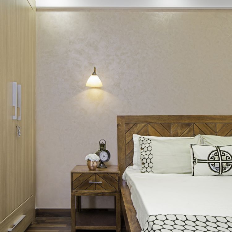 Light-Coloured Bedroom Wall Paint With A Textured Finish | Livspace