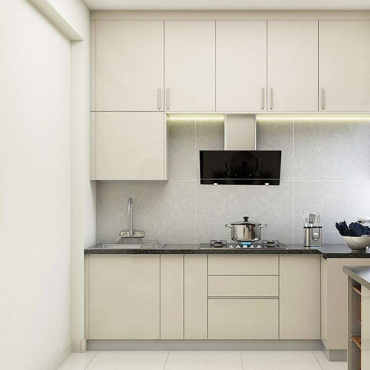 Spacious Kitchen Design With Cream Cabinets And Lofts | Livspace