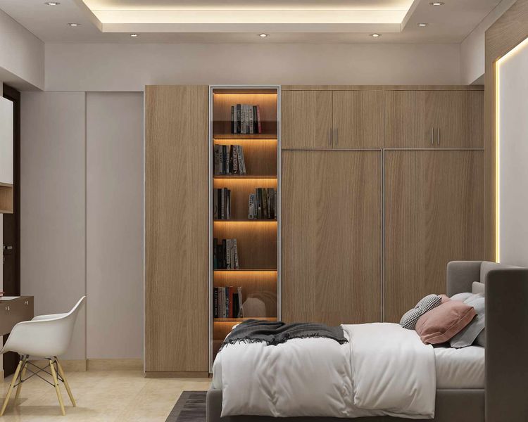 Spacious Bedroom Design With A Swing Wardrobe With Loft Storage | Livspace