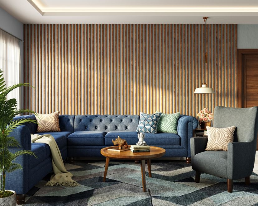 Living Room Wall Design With Wooden Fluted Panels And Blue Sofa | Livspace