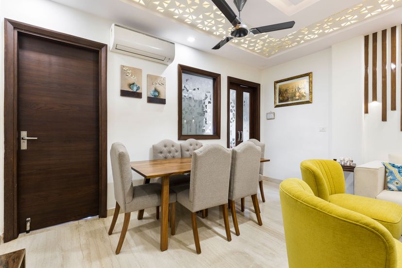 Delhi 3-BHK Interior Design With Colourful Living Room And Ornamental ...