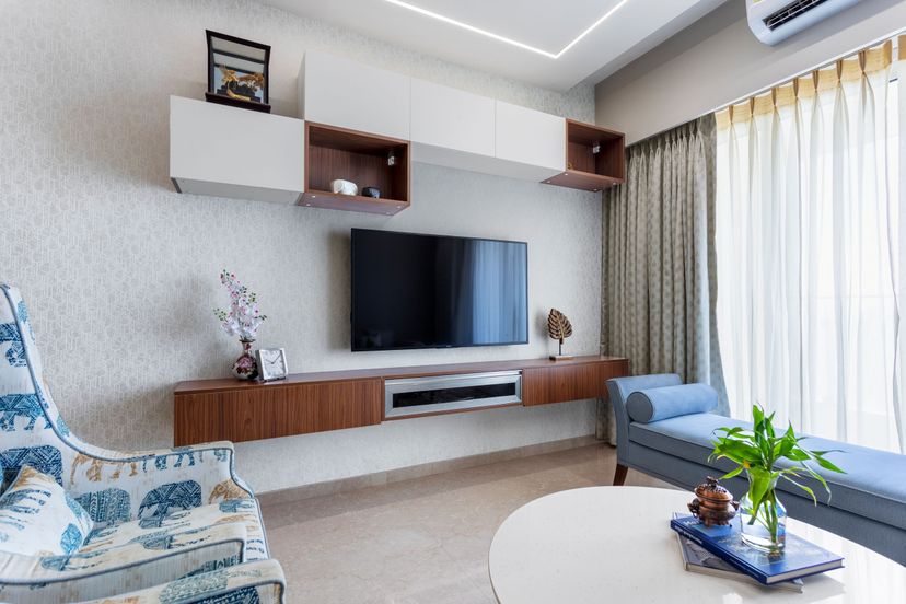 Compact Living Room Design With L Shaped Multicoloured Sofa Set And White And Wood TV Unit ...