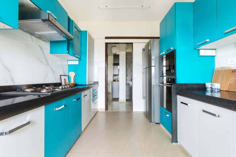 Blue And Frosty White Parallel Kitchen Design With Marble Backsplash ...
