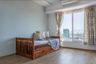 12x14 Ft Kids Room Design With Single Wooden Bed And Bluish Grey Accent Wall - Livspace