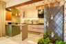 Open Kitchen Design with Granite Island and Mosaic Backsplash