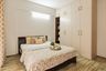Master Bedroom Design with Full-Height Wardrobe and Hydraulic Storage Bed