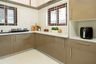 L-Shaped Kitchen Design with Quartz Countertops