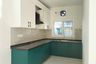 L-Shaped Emerald And White Kitchen Design With Granite Countertop