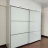 2-Door Sliding Wardrobe Design with Handle-Free Panels and Upper Cabinets