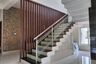 L-Shaped Staircase Design With Granite Top And Glass Railing