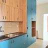 "Parallel Kitchen Design with Suede Laminate and Quartz Countertop Parallel Kitchen Design with Blue and Wooden Cabinets"