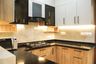 U-Shaped Kitchen Design with Walnut Bronze and Frosty White
