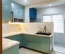 Bright Aqua Green U-Shaped Kitchen Design With Quartz Countertops