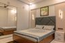 Guest Bedroom Design With Cream Fluted Wall Panel