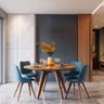 Dining Room Design with Angled Wooden Table and Blue Chairs