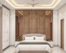 Guest Bedroom Design With Walnut Paneling and Cove Lighting